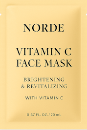 Norden kirkastava C-vitamiini kasvonaamio keltaisessa pakkauksessa.